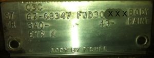 67 Cadilliac body plate