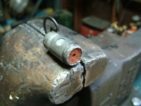 Condenser in vise front view