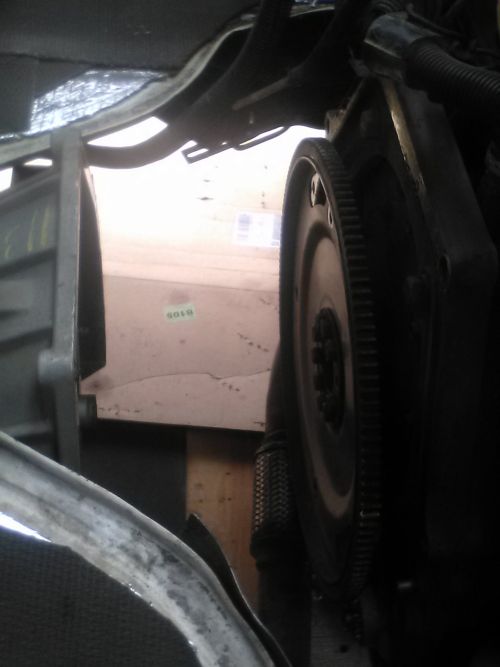 Flywheel Exposed From Doghouse