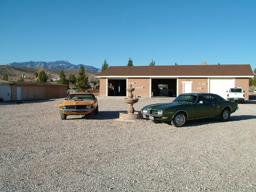 68 Firebird on the road with a Mustang